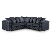 Luxury Aston plush fabric black corner sofa featuring spacious L-shaped seating, deep foam cushions, supportive back cushions, and contemporary styling for modern UK homes.