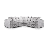 Luxury Aston silver plush fabric corner sofa featuring deep foam seating, spacious L-shaped design, supportive cushions, and modern styling for contemporary UK homes.