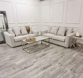 Luxury Blakely 3 and 2 seater fabric sofa set with deep cushioned seating, modern design, and elegant upholstery in a contemporary UK living room.
