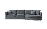 curved bouclé corner chaise sofa in Pebble and Charcoal with a sculptural organic design, deep cushions, and premium upholstery for modern UK living rooms.
