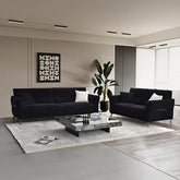 Luxury black bouclé sofa with deep channel stitching, premium textured upholstery, and a modern contemporary design available in 2, 3, and 4 seater sizes.