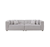 Murray sofa upholstered in premium putty bouclé fabric featuring Chesterfield-inspired button detailing, bold box arms, and contemporary styling for modern UK living rooms.