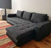 Berlin fabric corner sofa bed with hidden storage compartments, pull-out sleeping function, universal left or right-hand configuration, and contemporary styling for modern UK homes.
