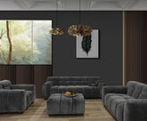 Modern velvet sofa set featuring 3 seater, 2 seater, armchair and matching footstool.