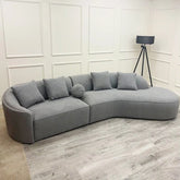 Luxury Pebble Bouclé Sofa with a sculptural curved design, soft textured bouclé upholstery, deep cushions, and premium comfort for modern UK living rooms.