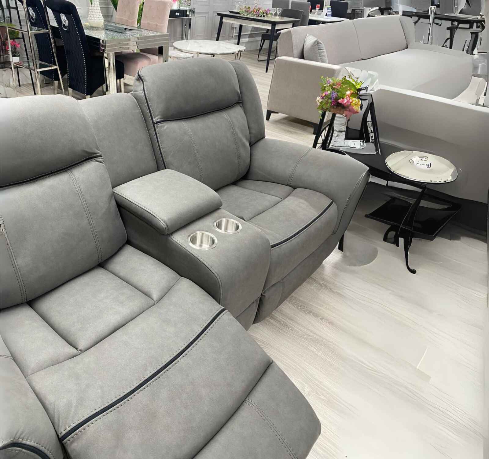 Grey suede leather 2 seater recliner sofa designed for everyday family relaxation.