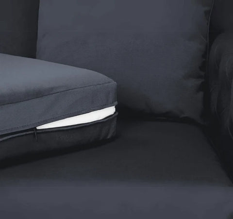 Aston plush fabric black corner sofa featuring spacious L-shaped seating, deep foam cushions, supportive back cushions, and contemporary styling for modern UK homes.