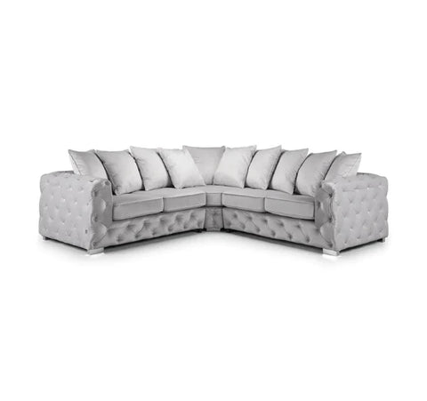 Luxury Aston silver plush fabric corner sofa featuring deep foam seating, spacious L-shaped design, supportive cushions, and modern styling for contemporary UK homes.