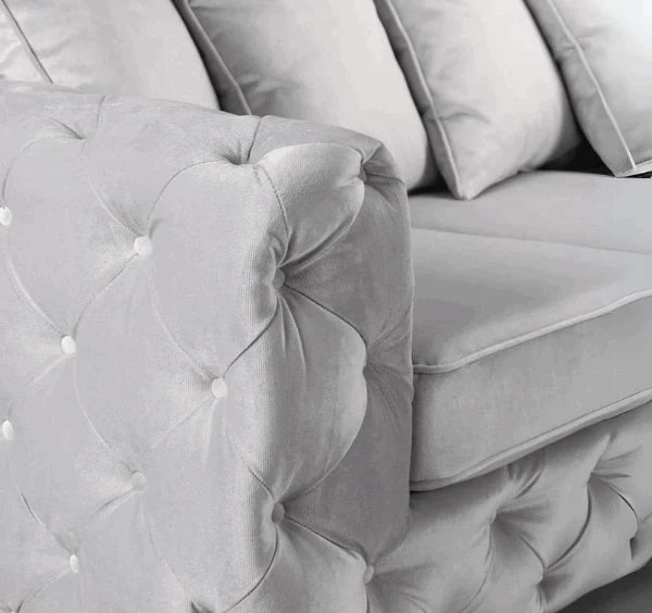 Luxury Aston silver plush fabric corner sofa featuring deep foam seating, spacious L-shaped design for contemporary UK homes.