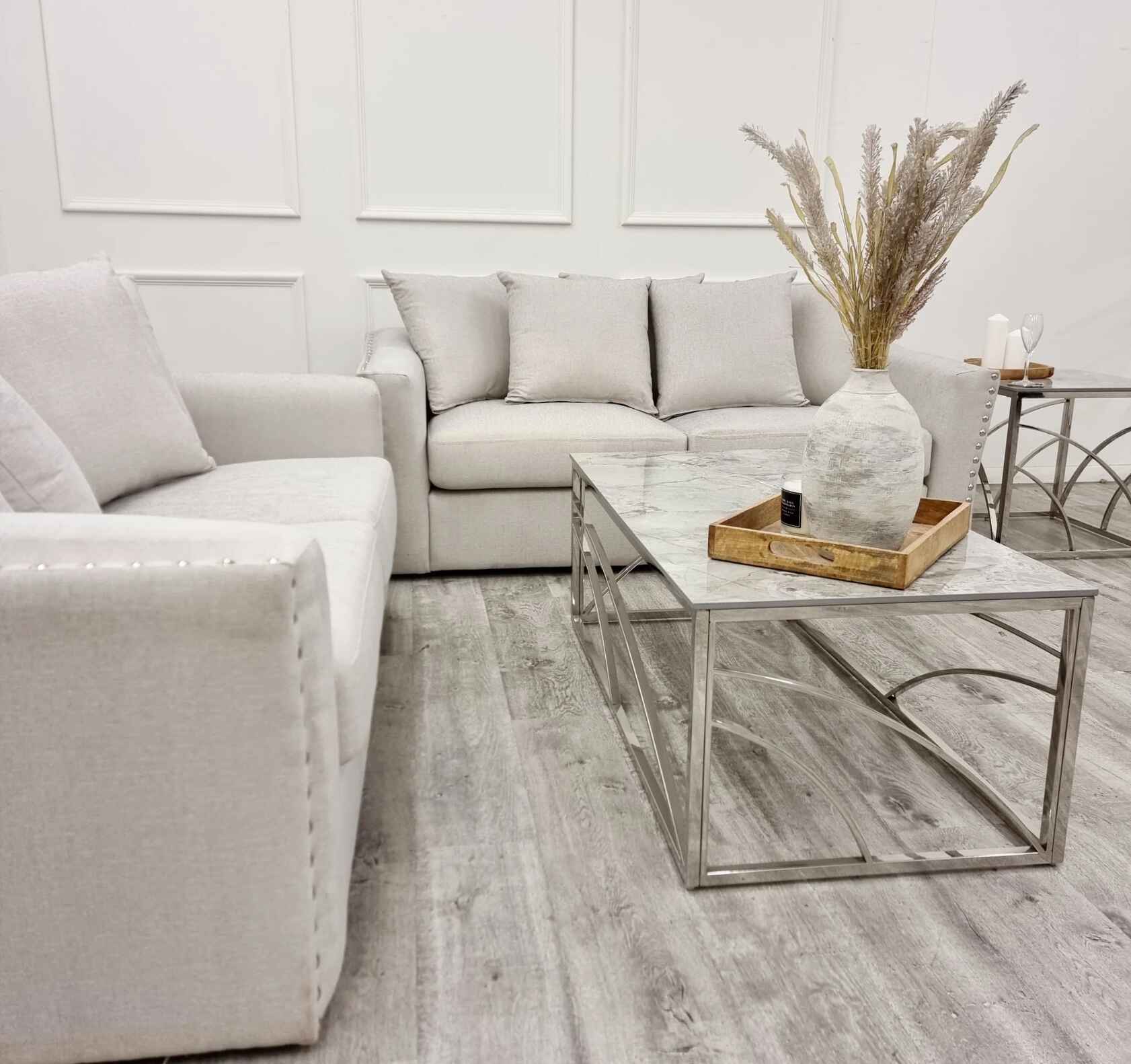Blakely 3 and 2 seater fabric sofa set with deep cushioned seating, modern design, and elegant upholstery in a contemporary UK living room.