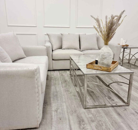 Blakely 3 and 2 seater fabric sofa set with deep cushioned seating, modern design, and elegant upholstery in a contemporary UK living room.