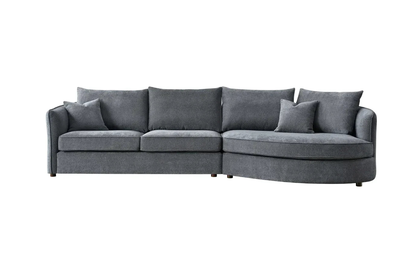 curved bouclé corner chaise sofa in Pebble and Charcoal with a sculptural organic design, deep cushions, and premium upholstery for modern UK living rooms.