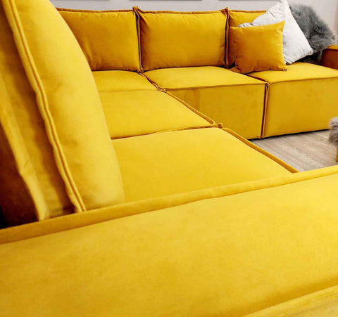 5-piece Claridge modular velvet corner sofa with full-back cushions, deep foam seating, square arms, and spacious contemporary design for modern UK living rooms.