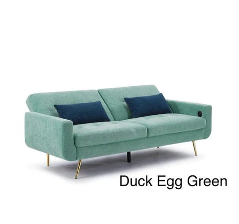 Luxury Lexi 3-seater fabric sofa bed with built-in USB charging ports, adjustable backrest, gold metal legs, and contemporary styling in a modern UK living room.