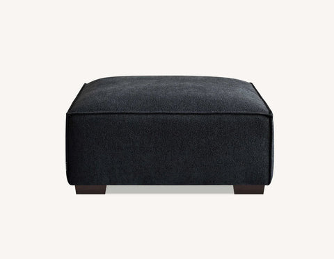 Luxury charcoal bouclé 4 seater sofa with chaise for modern UK living rooms.