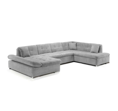 Scaffti U-shaped sofa bed with hidden storage, pull-out sleeping function, deep cushioned seating, and contemporary fabric upholstery in a modern UK living room.