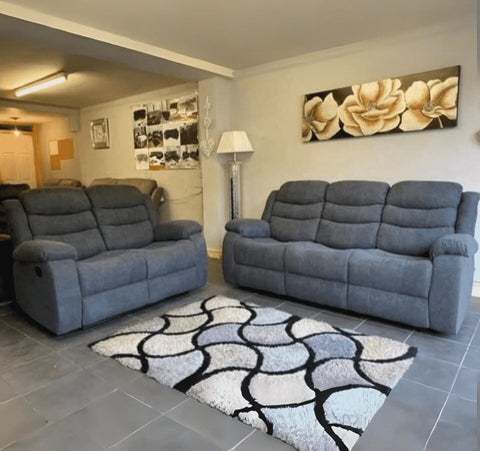 Sorrento grey fabric 3+2 recliner sofa set with comfortable manual reclining seats.