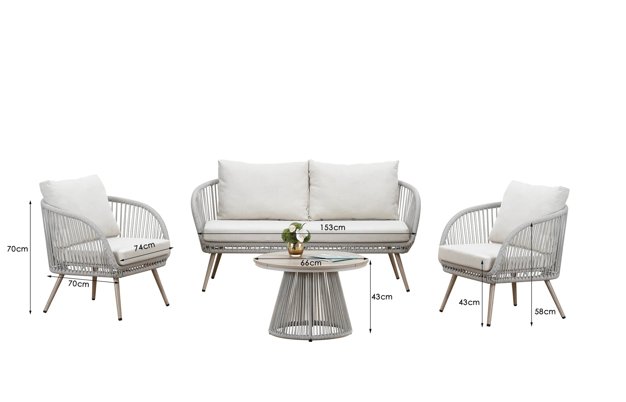 Natural rattan garden lounge set with weather-resistant cushions and matching coffee table on a contemporary outdoor patio.