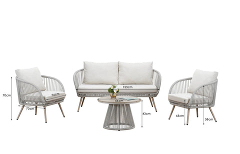 Natural rattan garden lounge set with weather-resistant cushions and matching coffee table on a contemporary outdoor patio.