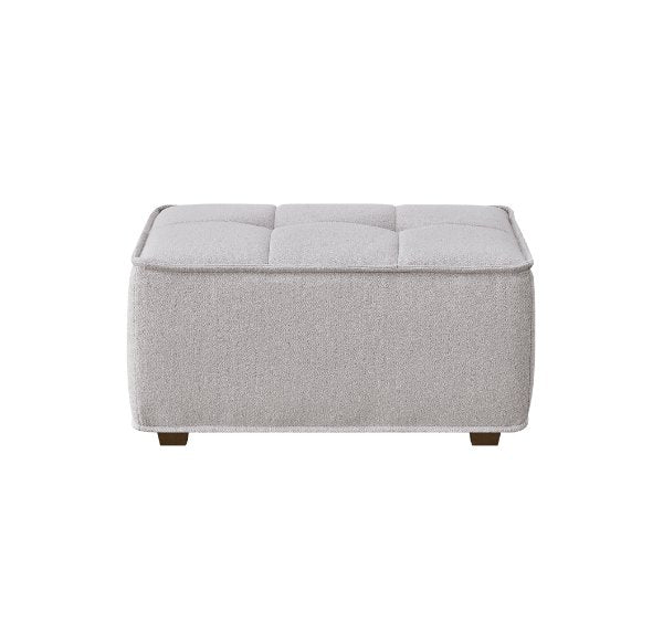 Luxury Murray sofa upholstered in premium putty bouclé fabric featuring Chesterfield-inspired button detailing, bold box arms, and contemporary styling for modern UK living rooms.