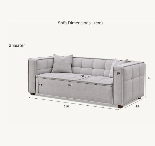 Luxury Murray sofa upholstered in premium putty bouclé fabric featuring Chesterfield-inspired button detailing, bold box arms, and contemporary styling for modern UK living rooms.