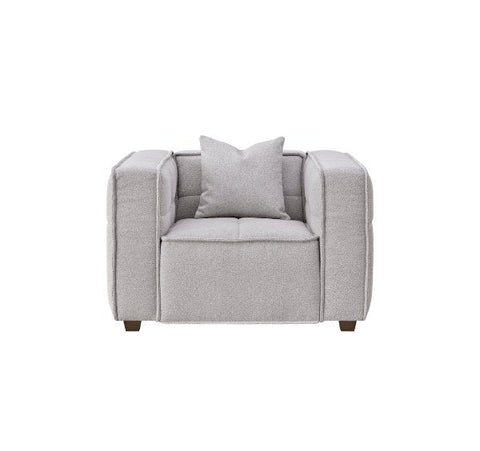 Luxury Murray sofa upholstered in premium putty bouclé fabric featuring Chesterfield-inspired button detailing, bold box arms.