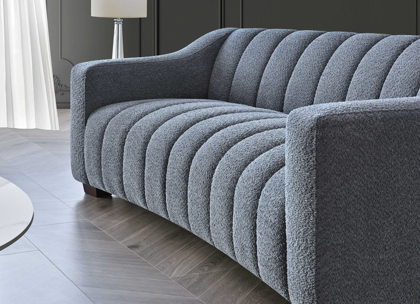 bouclé sofa in iron grey with deep channel stitching, premium textured fabric, and a contemporary Chesterfield-inspired design for modern living rooms.