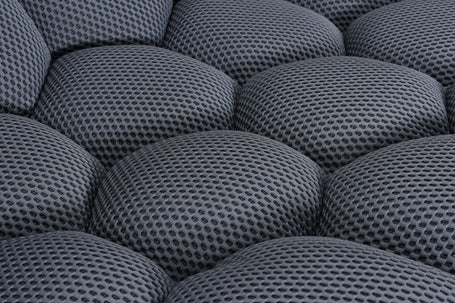 Contemporary grey bubble style sofa upholstered in breathable 3D mesh fabric.