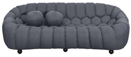 Modern three seater grey sofa with rounded sculptural silhouette for UK homes.