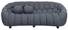 Modern three seater grey sofa with rounded sculptural silhouette for UK homes.