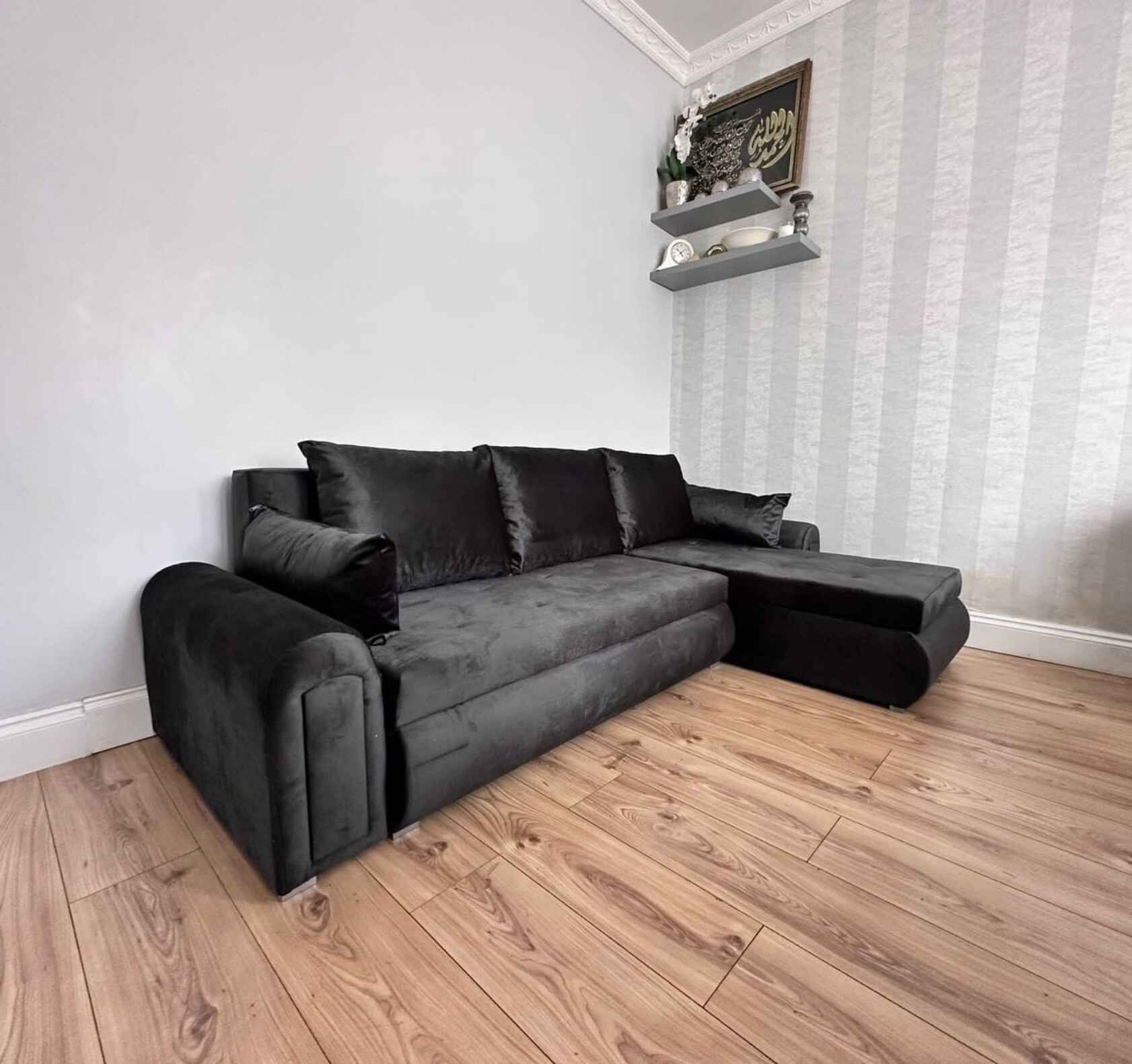 Luxury Berlin fabric corner sofa bed with hidden storage compartments, pull-out sleeping function, universal left or right-hand configuration, and contemporary styling for modern UK homes.