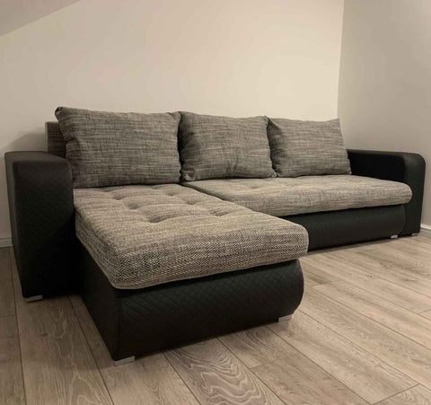 Luxury Berlin fabric corner sofa bed with hidden storage compartments, pull-out sleeping function, universal left or right-hand configuration, and contemporary styling for modern UK homes.