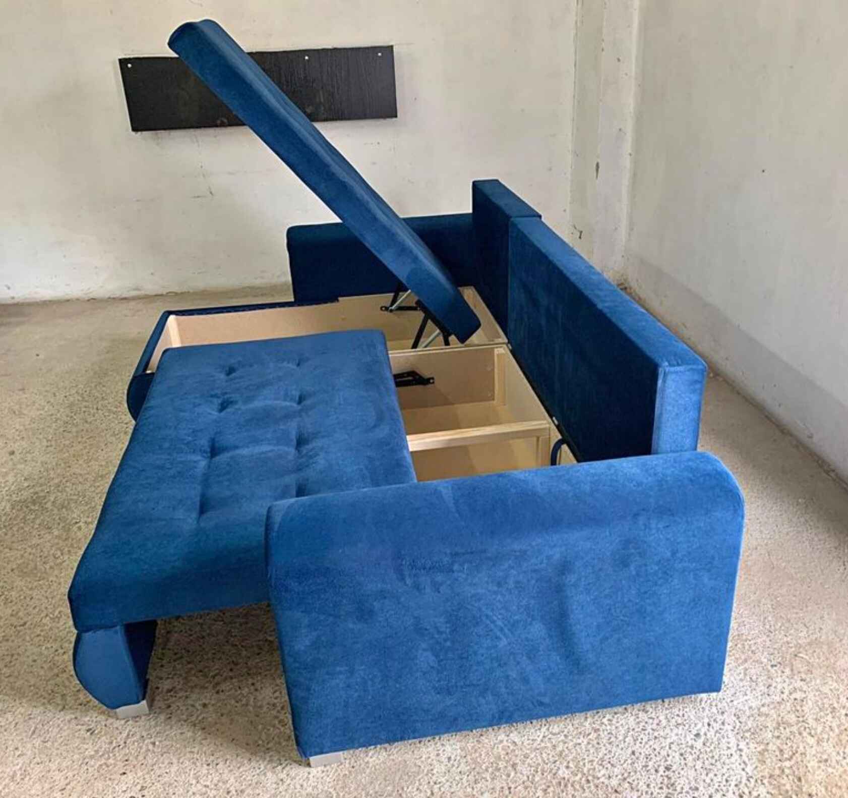 Luxury Berlin fabric corner sofa bed with hidden storage compartments, pull-out sleeping function.