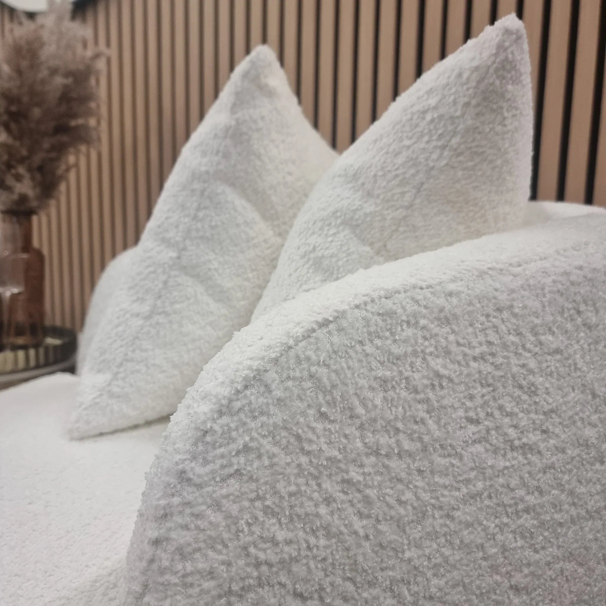 Modern Cuddle bouclé armchair for stylish contemporary living rooms.