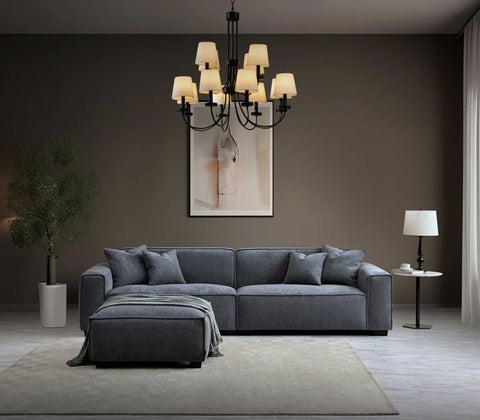 Luxury charcoal bouclé 4 seater sofa with chaise for modern UK living rooms.