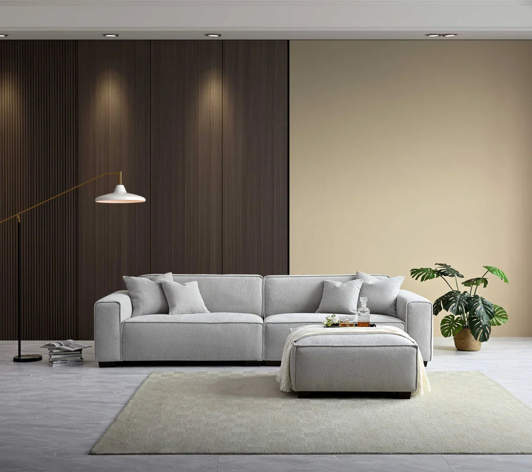 Premium 4 seater fabric sofa with chaise in charcoal grey for family homes.