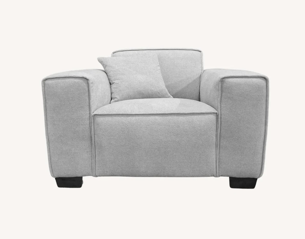 Large luxury charcoal grey fabric sofa with chaise for contemporary interiors.