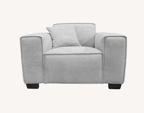 Large luxury charcoal grey fabric sofa with chaise for contemporary interiors.