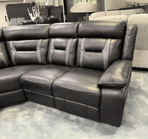 Luxury black electric corner recliner sofa with grey accents for modern UK living rooms.