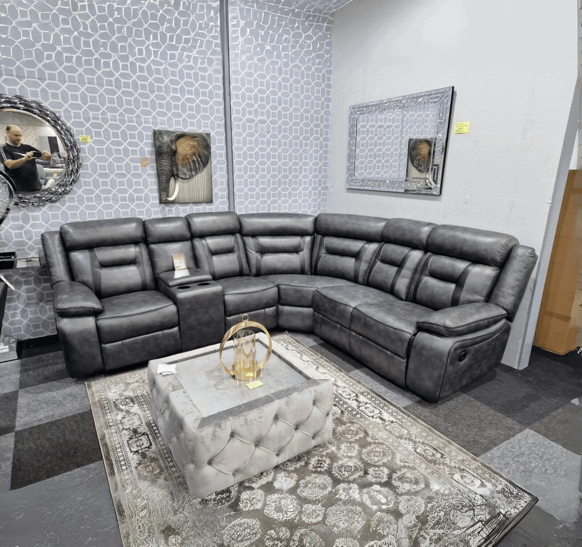 Nova grey electric leather corner recliner sofa with USB charging ports and cup holder console.