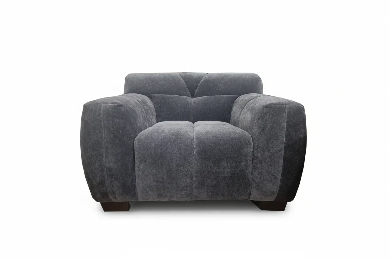 Contemporary steel grey velvet sofa with sophisticated curved arm design.