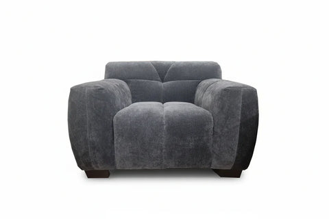 Contemporary steel grey velvet sofa with sophisticated curved arm design.
