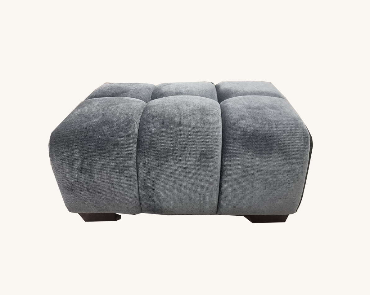 Luxury three seater velvet sofa with matching chair and footstool.