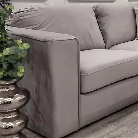 4 piece fabric corner sofa with fixed back cushions, modular L-shaped design, deep comfortable seating, and contemporary styling in a modern UK living room.