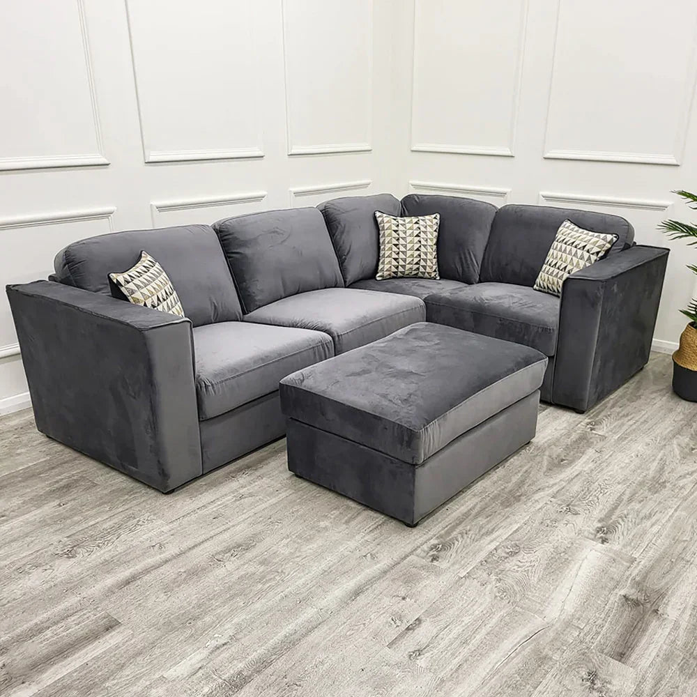 4 piece Luxury Hudson fabric corner sofa with fixed back cushions, modular L-shaped design, deep comfortable seating, and contemporary styling in a modern UK living room.