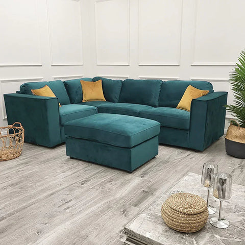 Luxury Hudson 4 piece fabric corner sofa with fixed back cushions, modular L-shaped design, deep comfortable seating, and contemporary styling in a modern UK living room.