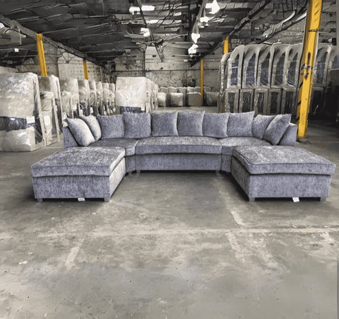 Luxury large U shape corner sofa with deep foam seating, movable footstools, removable washable covers, and contemporary styling for spacious UK living rooms.