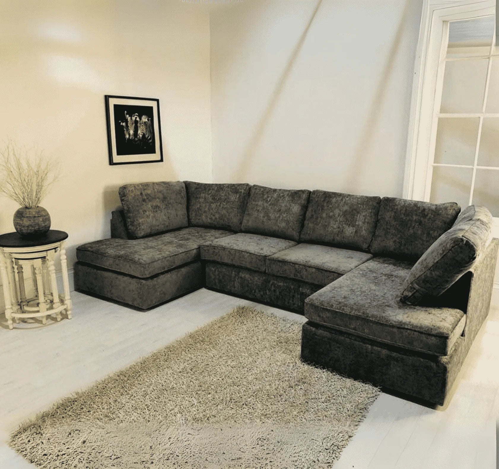 Luxury large U shape corner sofa with deep foam seating, movable footstools, removable washable covers, and contemporary styling for spacious UK living rooms.