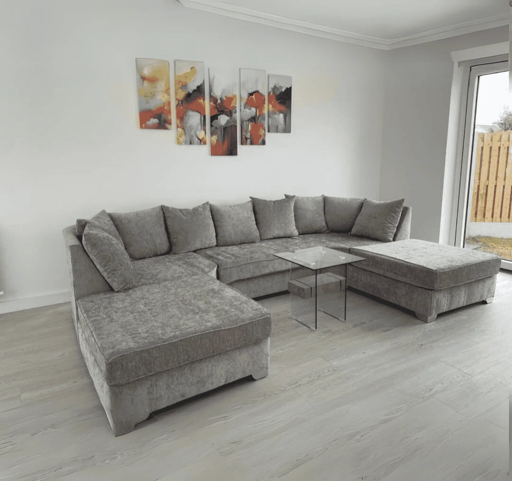 Luxury large U shape corner sofa with deep foam seating, movable footstools, removable washable covers, and contemporary styling for spacious UK living rooms.