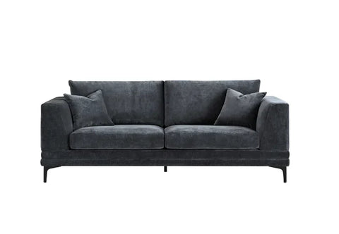 Luxury steel grey velvet sofa with a mid-century modern design, wooden plinth base, deep cushions, and elegant clean lines for contemporary UK living rooms.